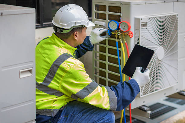 Professional Ac Installation technician working in Brookline Village, MA
